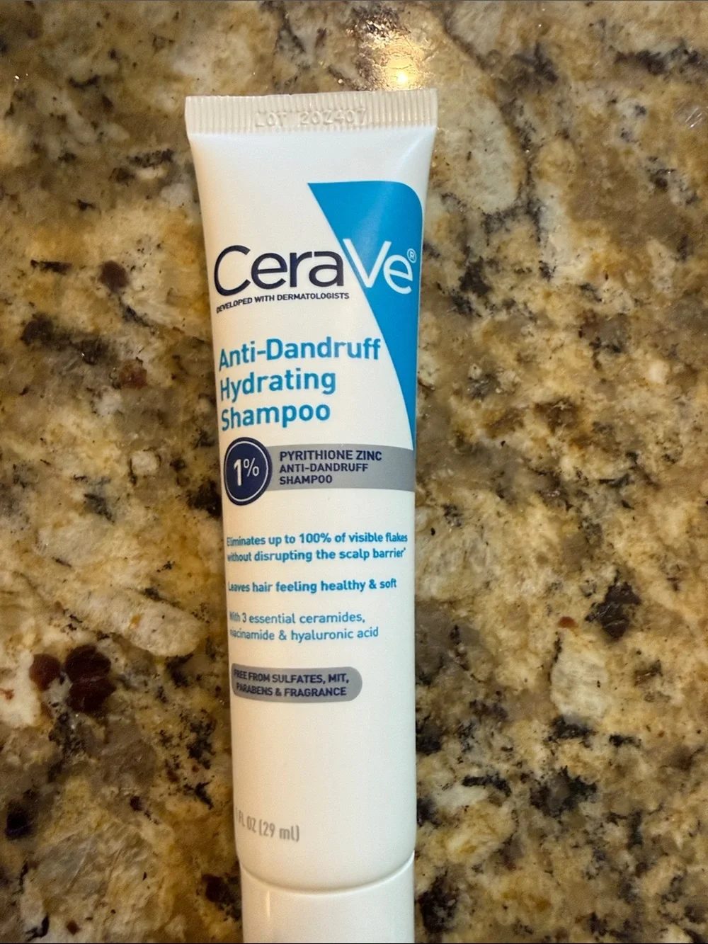 rave White Tube with Blue Accents Shampoo